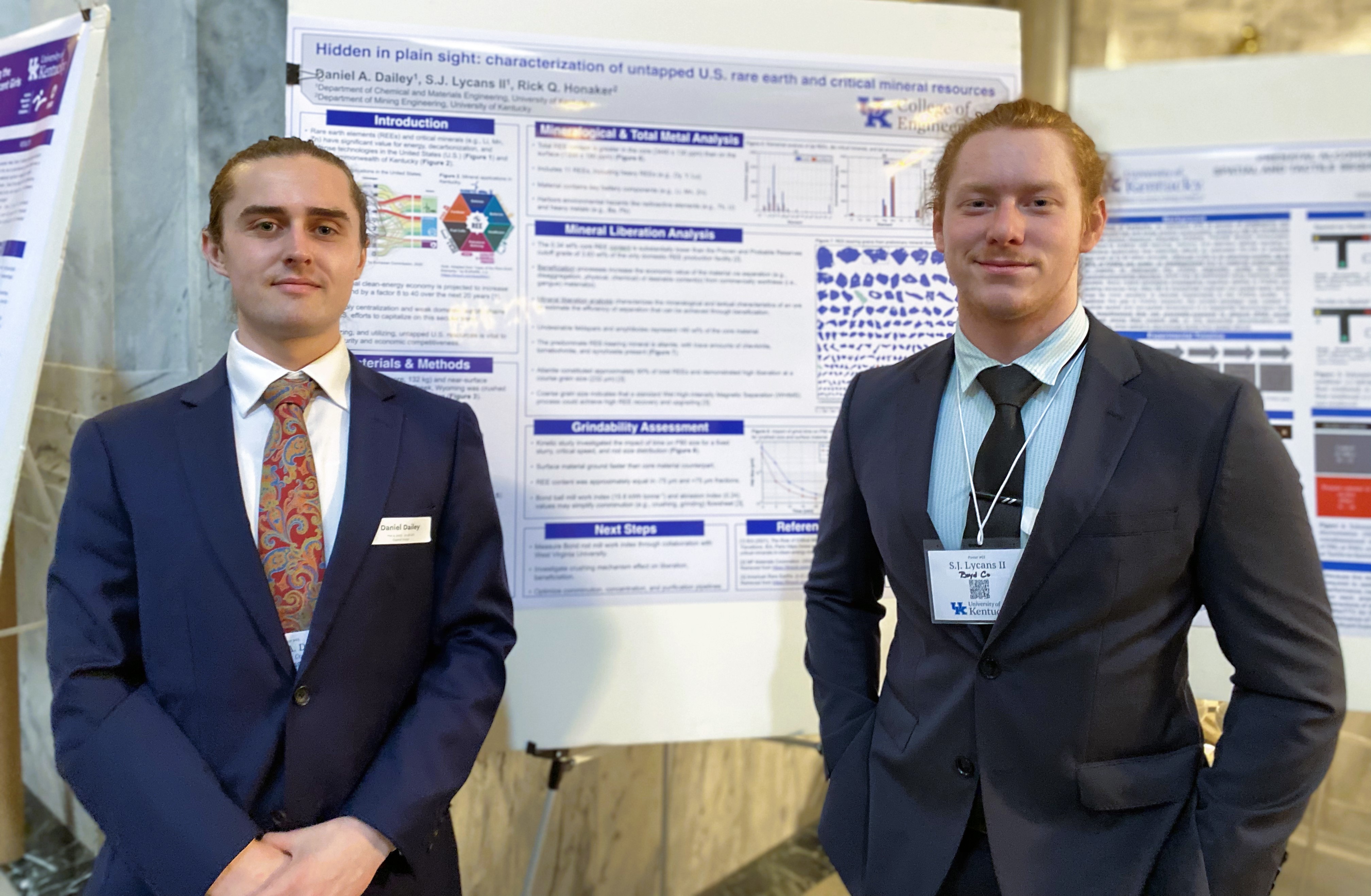 Senior Daniel Dailey and Freshman S.J. Lycans II with their research poster at the Capitol. 