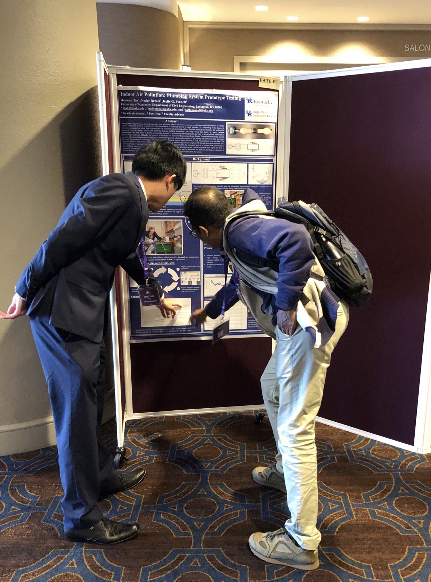 Civil Engineering doctoral student Hong Cheng (Herman) Tay discussing details of his research poster to a conference attendee.  His poster is entitled “Indoor Air Pollution: Plumbing System Prototype Testing.” Co-authors: Nader Rezaei, PhD and Kelly G. Pe