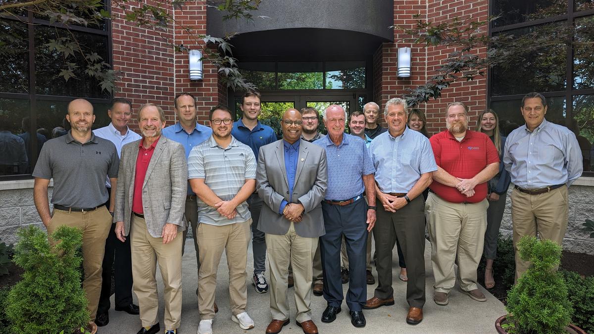 Ralph Palmer poses for a photo with civil engineering faculty and Dean Buchheit